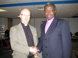 The Rev Stephen Fielding, rector of Agherton, meets Bishop Hilary of Yei at the CMSI lunch. 